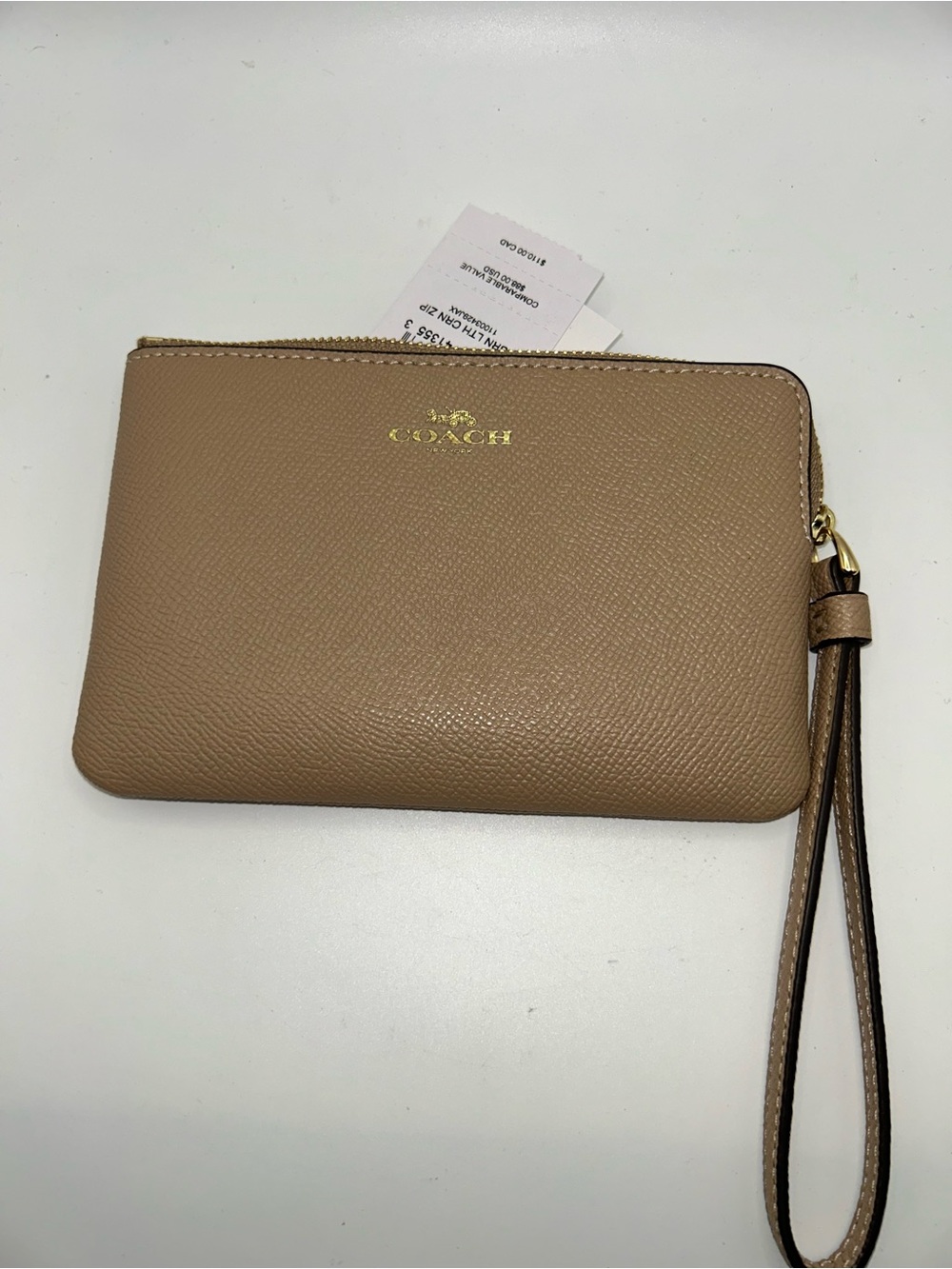 Coach new with tags tan wristlet
